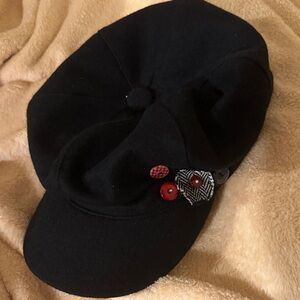 Stylish Black Newsboy Cap with Red Accents